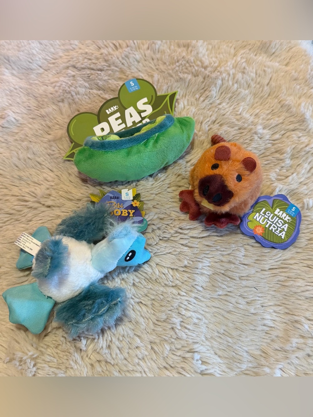BarkBox dog toys from "Bow Wow Bayou" collection